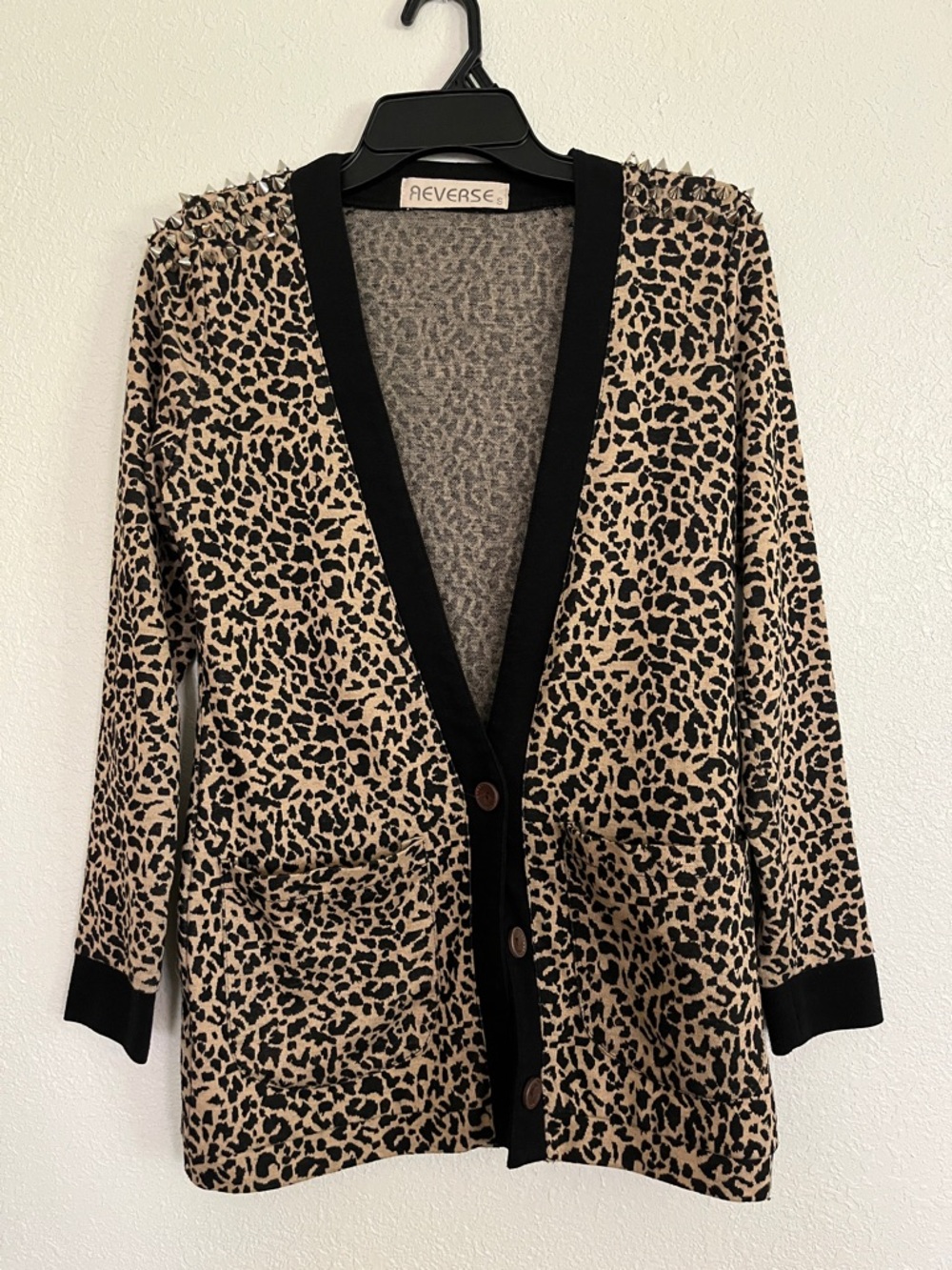 Reverse leopard sweater size small.